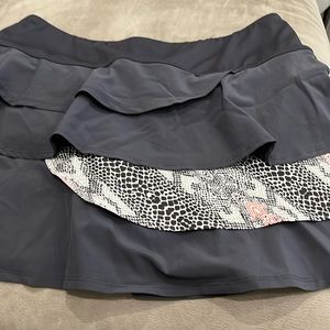 Tennis skirt with animal print accent